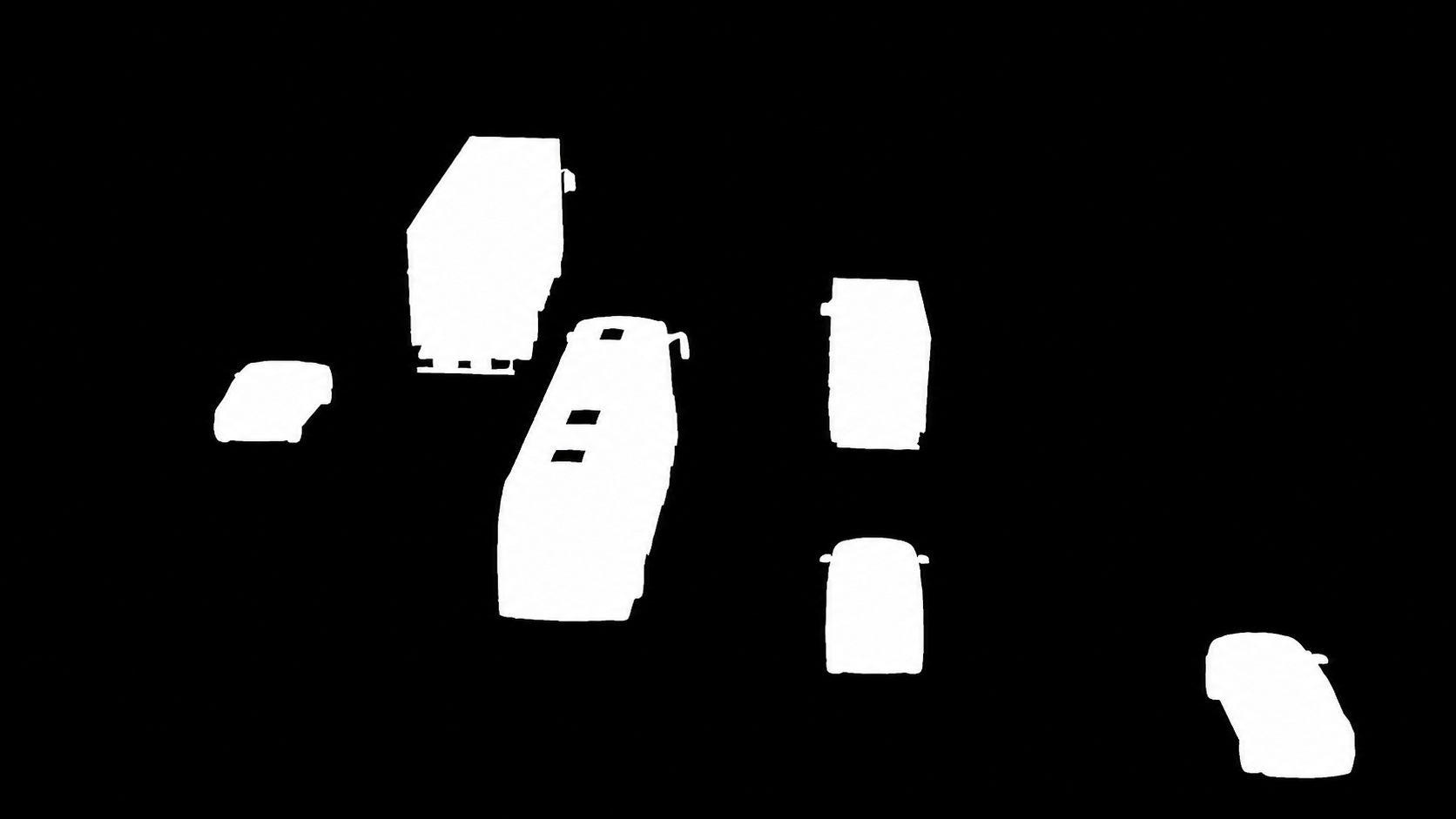 二值 mask：黑底白前景，7 個車輛 instance
